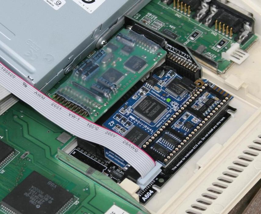 Risercard mounted with floppy drive screw